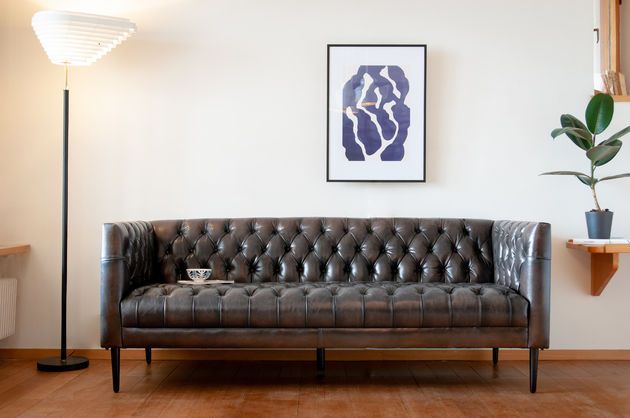 Grande divano Chesterfield in pelle Lopigna